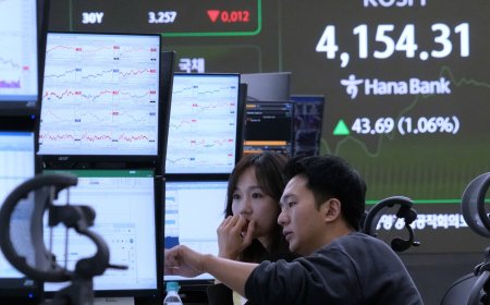 Asian shares track US stock market's rise to record highs despite AI bubble worries