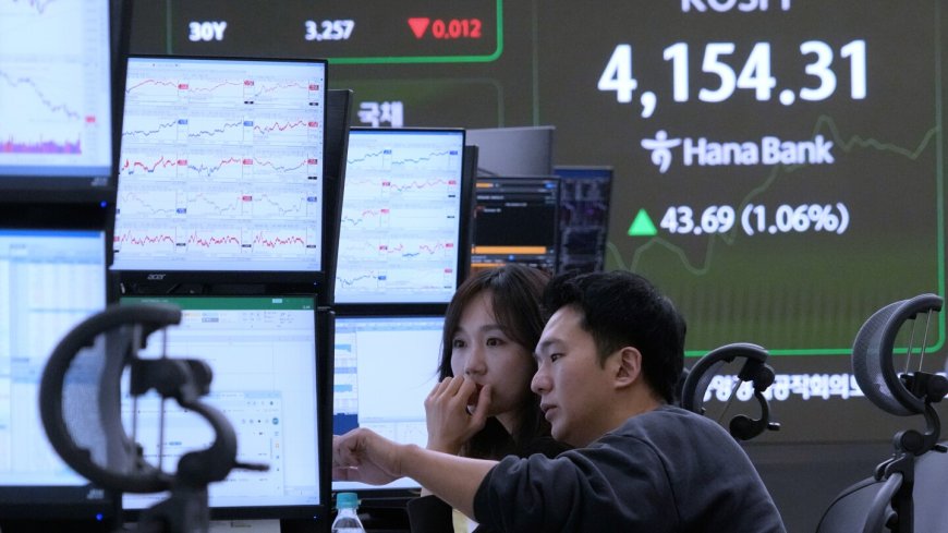 Asian shares track US stock market's rise to record highs despite AI bubble worries